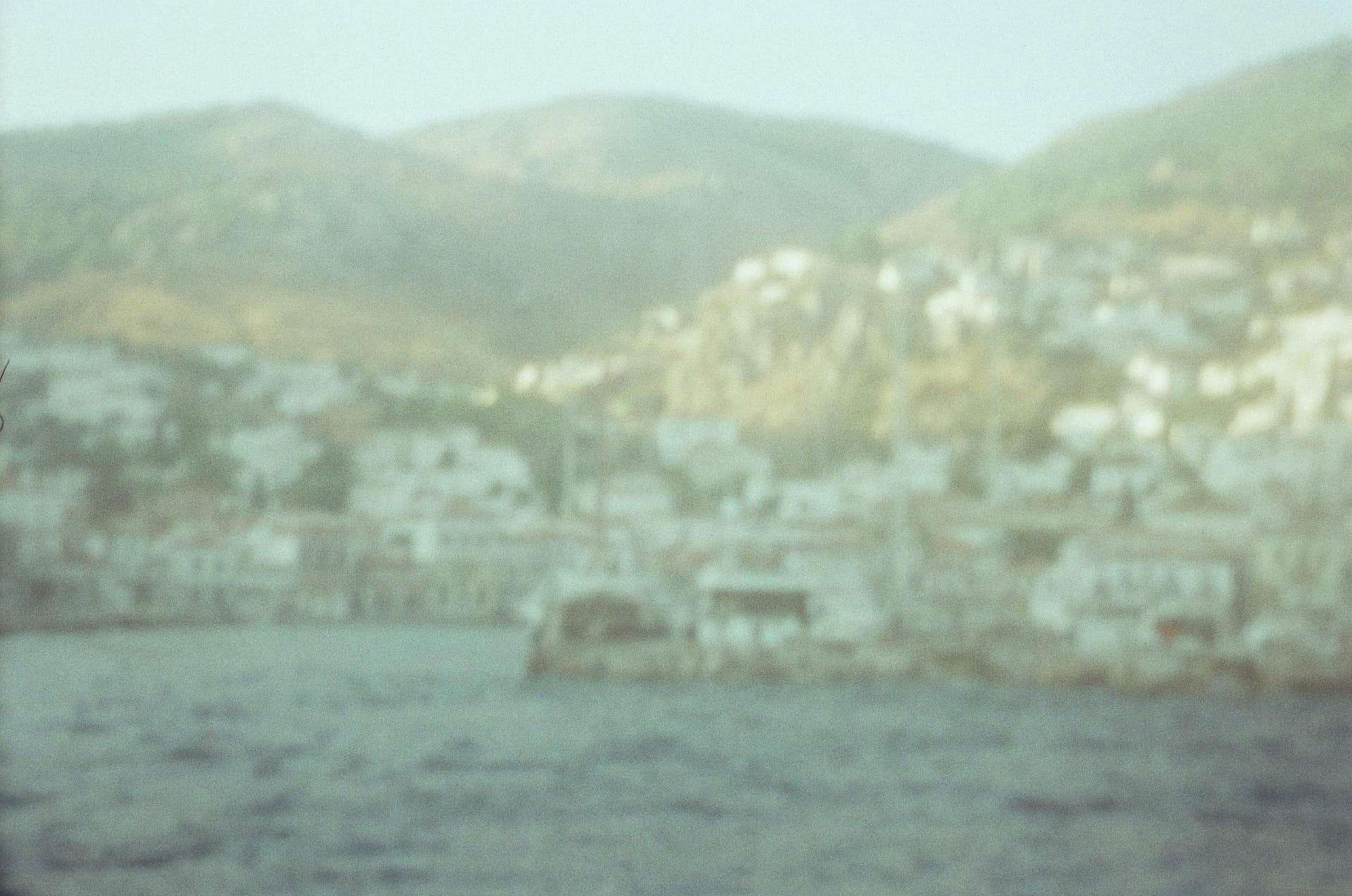 Hydra town lights through the evening haze